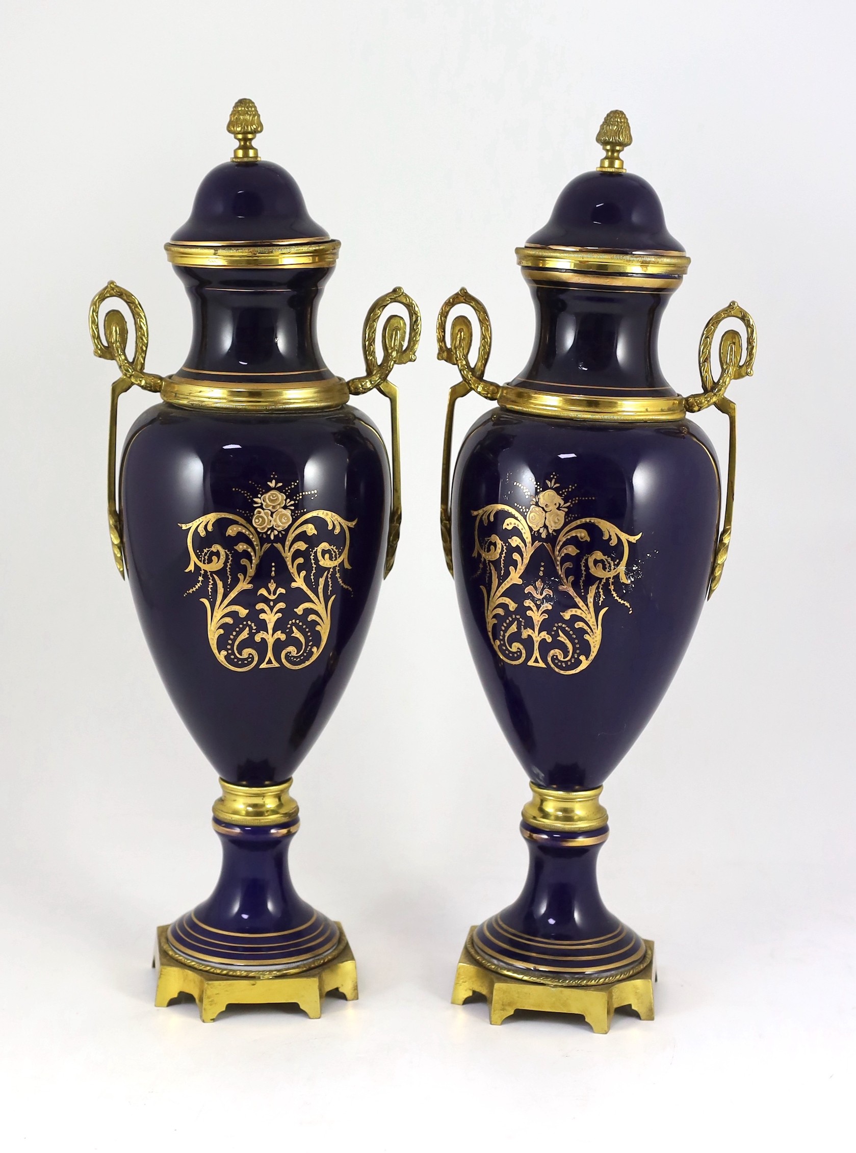 A pair of Sevres style porcelain and ormolu mounted vases, late 20th century, 49 cm high